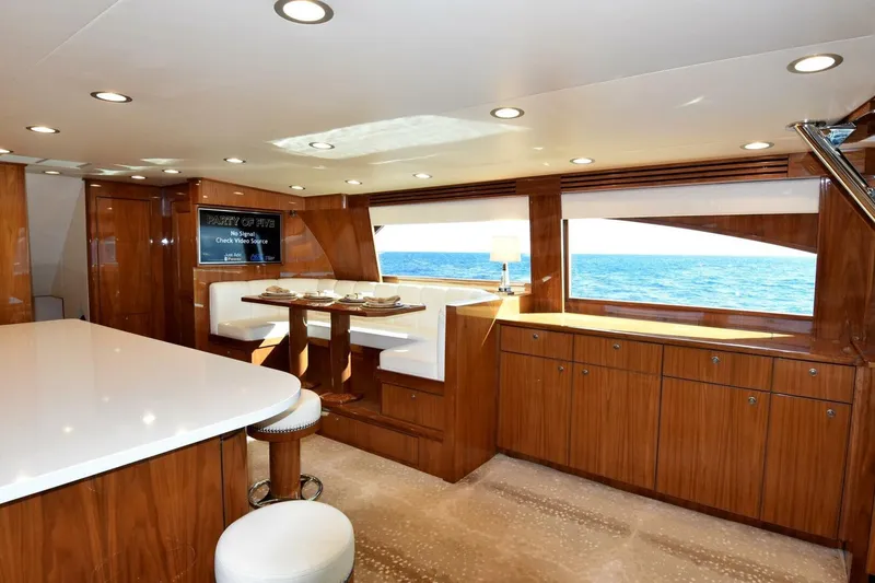 Slide: The Image of Luxurious interior of 2019 Viking 80 Sky Bridge yacht with ocean view. - 18