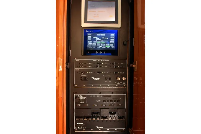 Slide: The Image of Control panel of 2019 Viking 80 Sky Bridge yacht with digital displays and switches. - 24