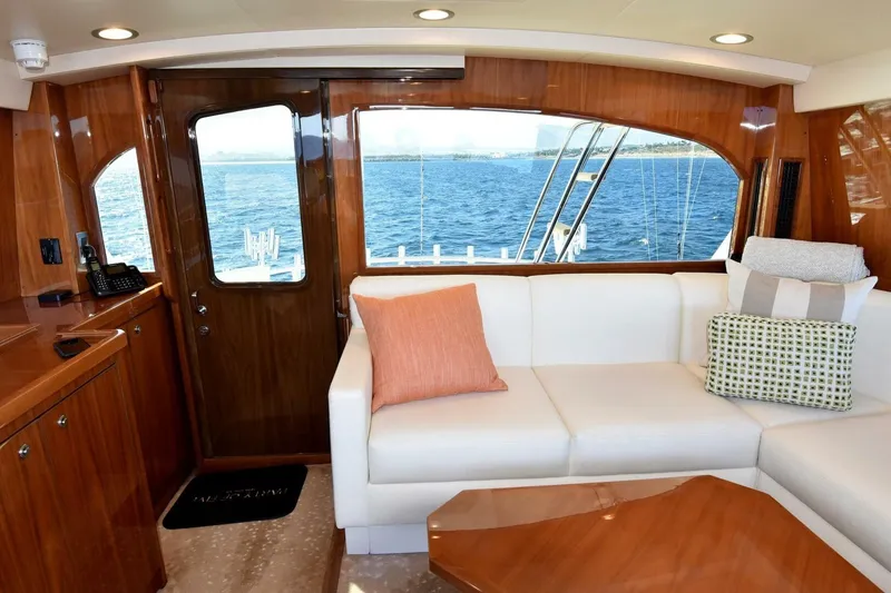 Slide: The Image of Luxurious interior of 2019 Viking 80 Sky Bridge yacht with ocean view. - 63