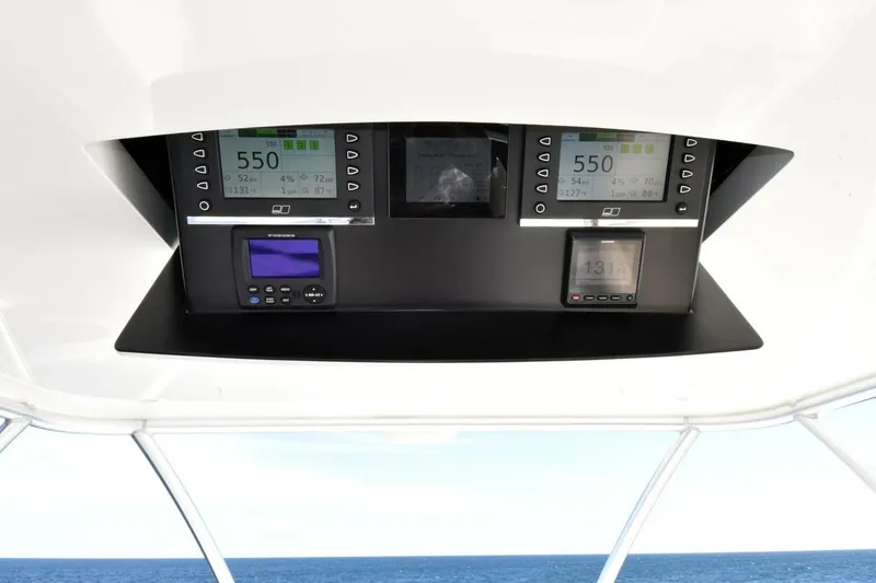 Slide: The Image of Control panel of 2019 Viking 80 Sky Bridge yacht with ocean view. - 67