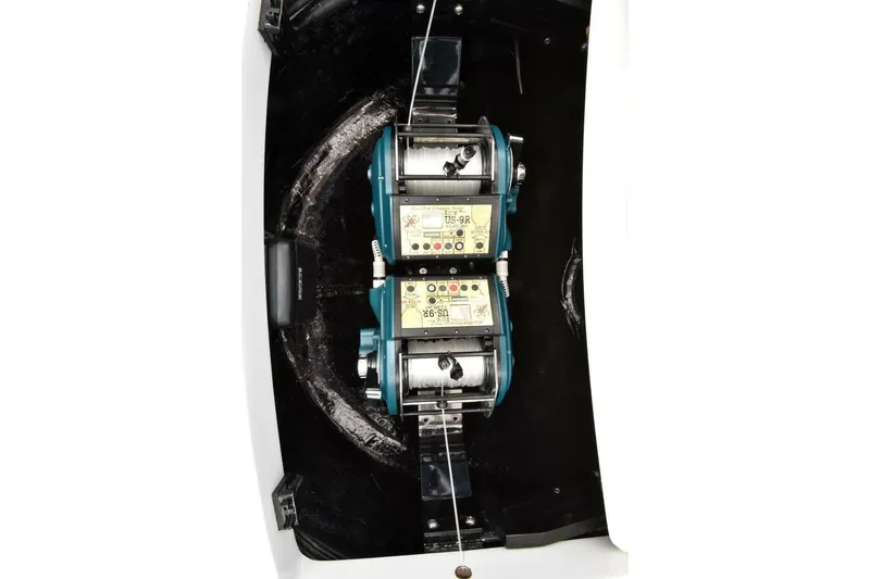 Slide: The Image of Dual electric fishing reels on 2019 Viking 80 Sky Bridge yacht. - 68