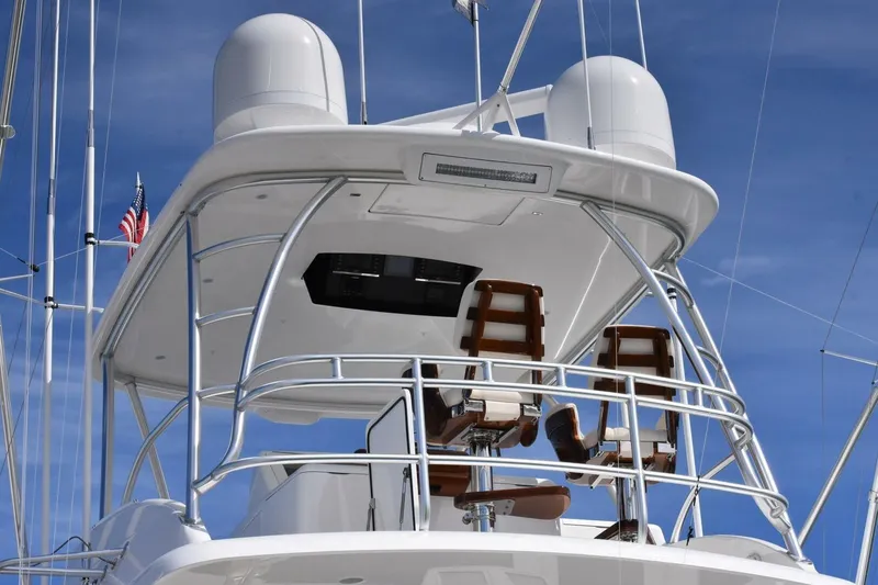 Slide: The Image of 2019 Viking 80 Sky Bridge yacht with sleek design and modern navigation equipment. - 77