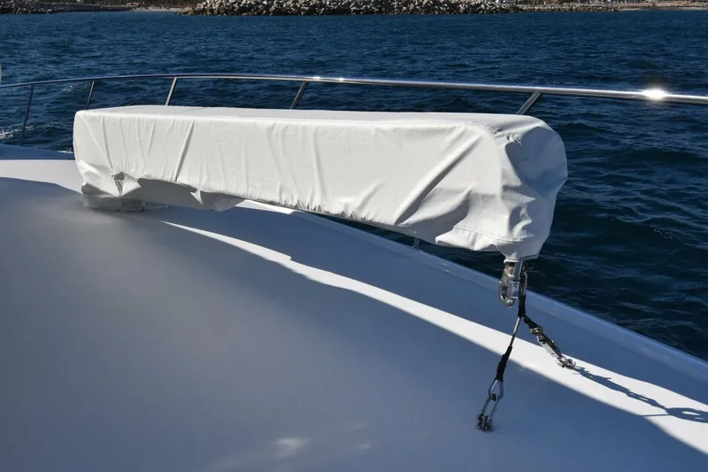 Slide: The Image of Covered equipment on 2019 Viking 80 Sky Bridge yacht deck, ocean background. - 84