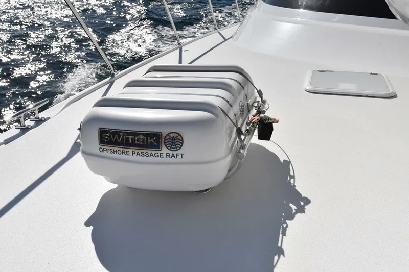 Slide: The Image of Offshore passage raft on 2019 Viking 80 Sky Bridge yacht deck, ocean background. - 87