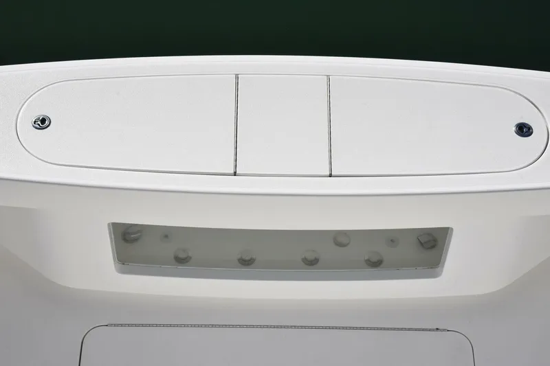 Slide: The Image of 2019 Viking 80 Sky Bridge yacht deck with storage compartment and sleek design. - 89