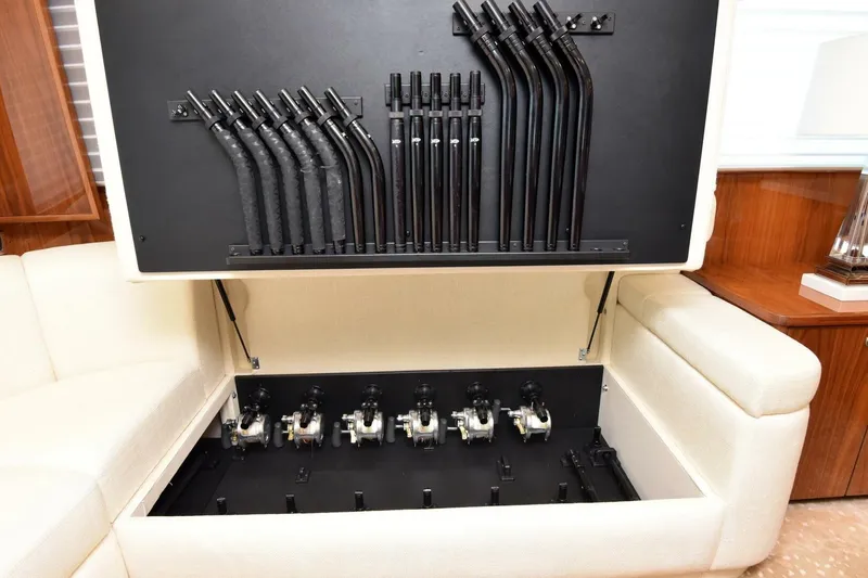 Slide: The Image of Hidden fishing rod storage in 2019 Viking 80 Sky Bridge yacht interior. - 9
