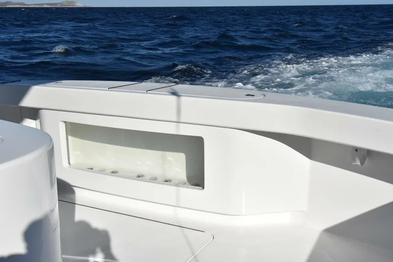 Slide: The Image of 2019 Viking 80 Sky Bridge yacht deck with ocean view and sleek design. - 90