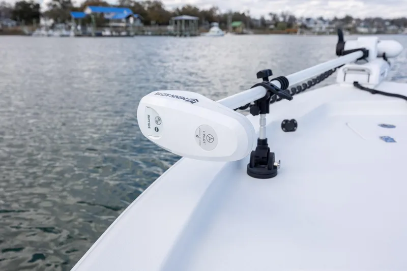 Slide: The Image of 2015 Sea Hunt BX 22 Pro boat with Minn Kota Riptide trolling motor on calm water. - 7