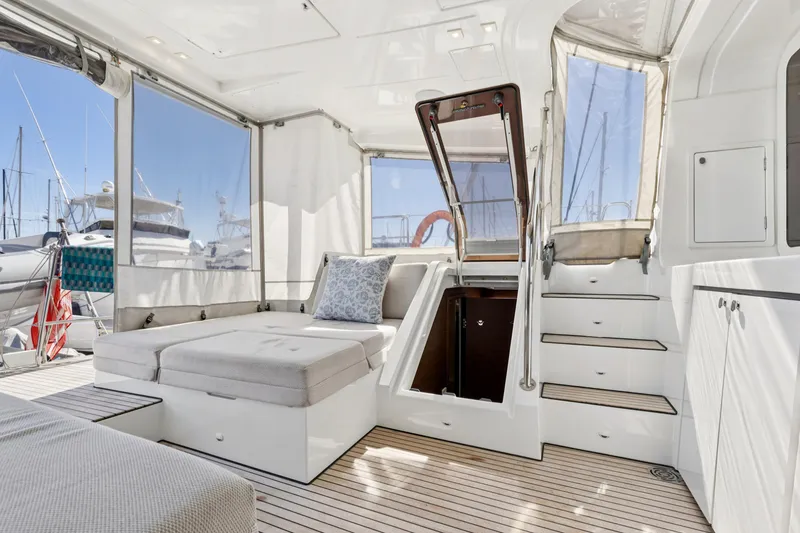 Slide: The Image of Luxurious interior of 2022 Lagoon 52 F yacht with modern seating and staircase. - 20