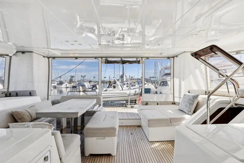 Slide: The Image of Luxurious interior of 2022 Lagoon 52 F yacht with marina view. - 22
