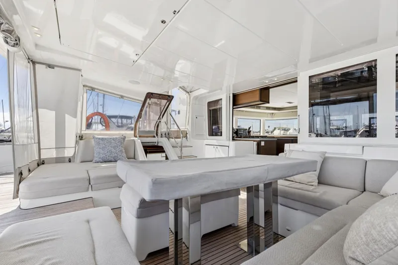 Slide: The Image of Luxurious interior of 2022 Lagoon 52 F catamaran with modern seating and elegant design. - 26
