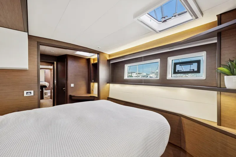 Slide: The Image of Luxurious interior of 2022 Lagoon 52 F yacht cabin with modern design. - 44