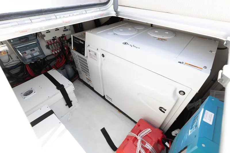 Slide: The Image of Engine room of 2022 Lagoon 52 F yacht with Cummins Onan generator. - 60