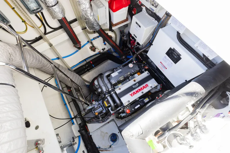 Slide: The Image of Engine room of 2022 Lagoon 52 F yacht with Yanmar engine and equipment. - 69