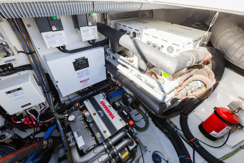Slide: The Image of Engine room of 2022 Lagoon 52 F yacht with Yanmar engine and electrical systems. - 72