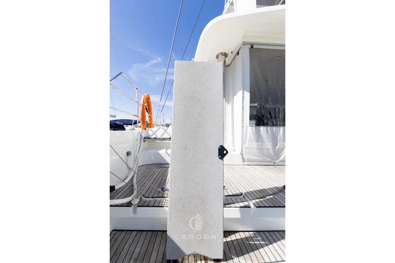 Slide: The Image of Lagoon 52 F 2022 yacht deck with clear blue sky background. - 77