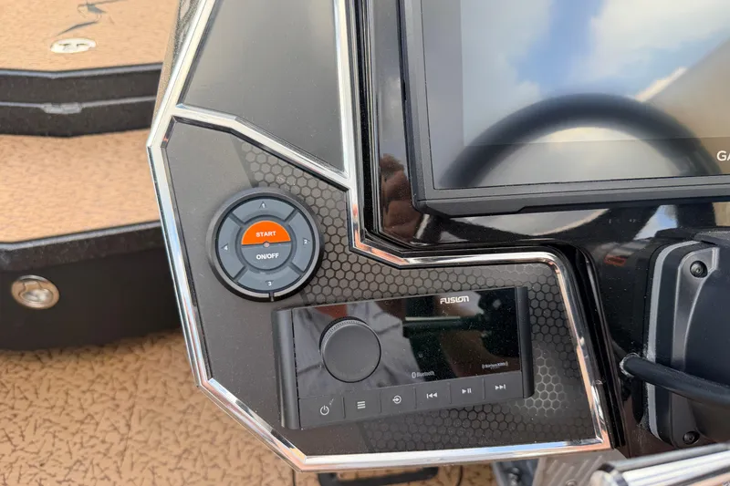 Slide: The Image of 2026 Vexus VXs21 boat dashboard with start button and Fusion audio controls. - 10