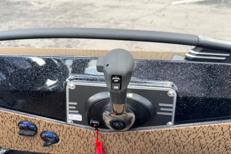Slide: The Image of 2026 Vexus VXs21 boat throttle control with up and down buttons. - 15