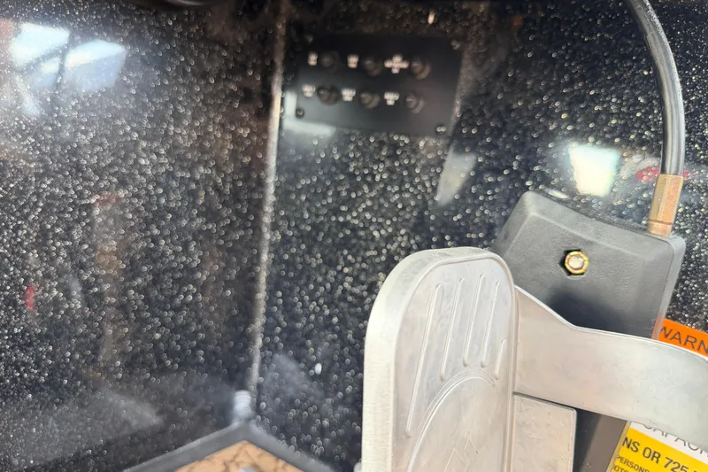 Slide: The Image of Interior view of 2026 Vexus VXs21 boat with control panel and pedal. - 17