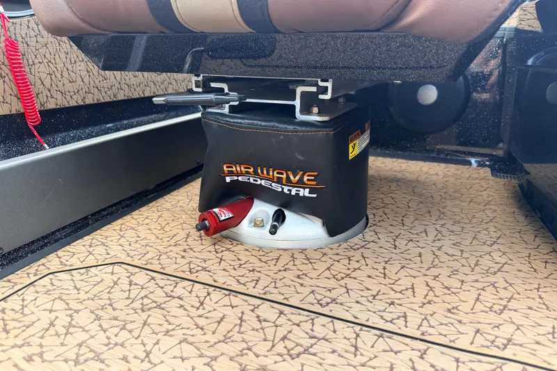 Slide: The Image of AirWave Pedestal in 2026 Vexus VXs21 boat, featuring patterned flooring and seat base. - 23