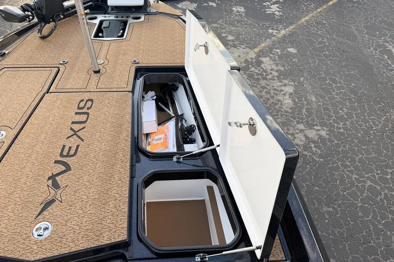 Slide: The Image of 2026 Vexus VXs21 boat storage compartments open, showcasing interior organization. - 32
