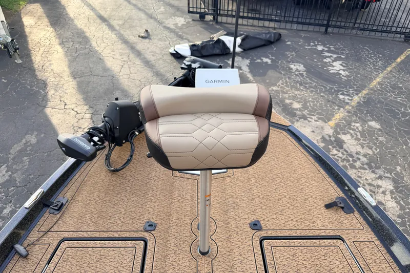 Slide: The Image of 2026 Vexus VXs21 boat with Garmin equipment and cushioned seat on deck. - 33