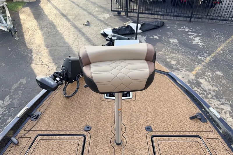 Slide: The Image of 2026 Vexus VXs21 boat deck with cushioned seat and Garmin equipment. - 34