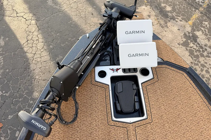 Slide: The Image of 2026 Vexus VXs21 boat deck with Garmin electronics and trolling motor. - 35