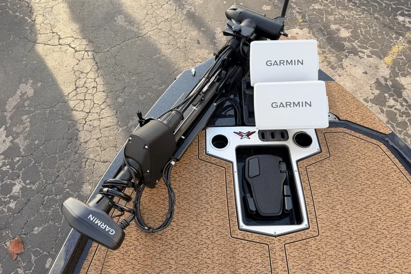 Slide: The Image of 2026 Vexus VXs21 boat deck with Garmin electronics and trolling motor. - 36