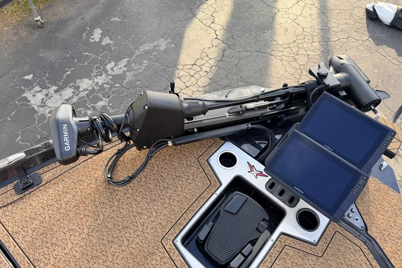 Slide: The Image of 2026 Vexus VXs21 boat with Garmin electronics and trolling motor on deck. - 38