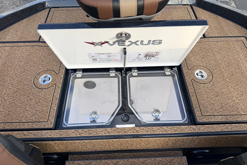 Slide: The Image of 2026 Vexus VXs21 boat deck with open storage compartments and stylish seating. - 40