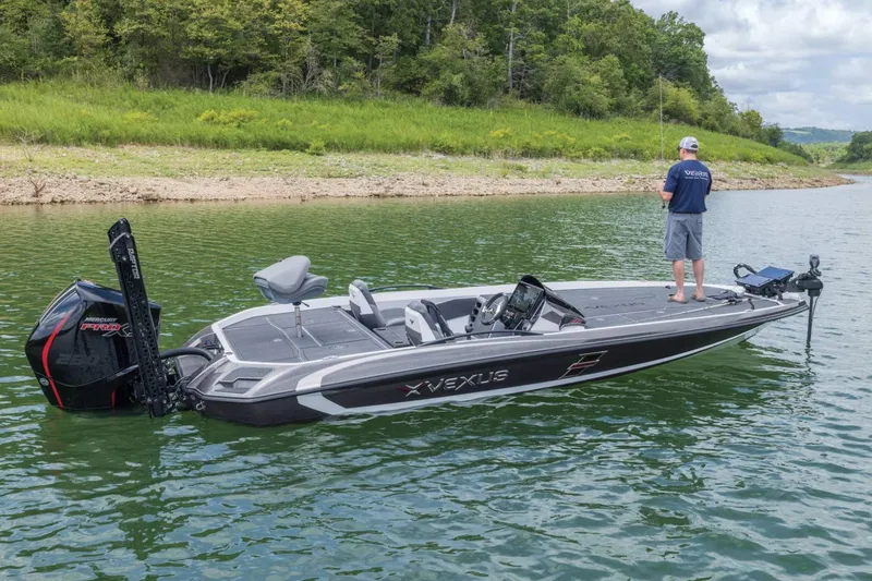 Slide: The Image of Manufacturer Provided Image: 2026 Vexus VXs21 boat on a lake with a person fishing. - 50