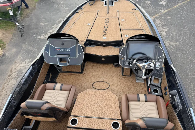 Slide: The Image of 2026 Vexus VXs21 boat interior with modern dashboard and seating. - 8