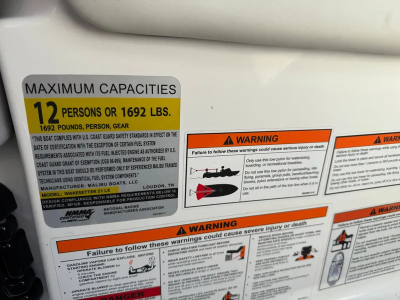 Slide: The Image of Safety and capacity labels for 2022 Malibu Wakesetter 21 LX. - 11