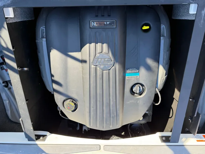 Slide: The Image of Engine compartment of 2022 Malibu Wakesetter 21 LX boat. - 19