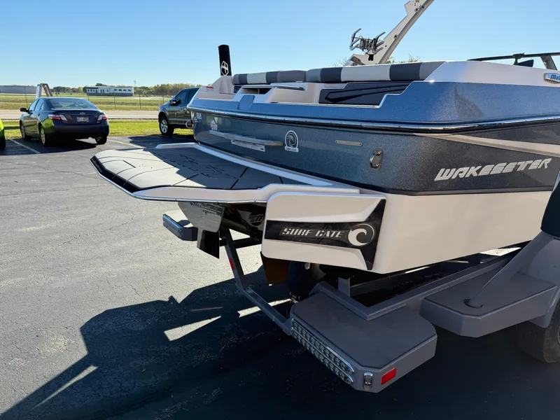 Slide: The Image of 2022 Malibu Wakesetter 21 LX boat with Surf Gate technology. - 21