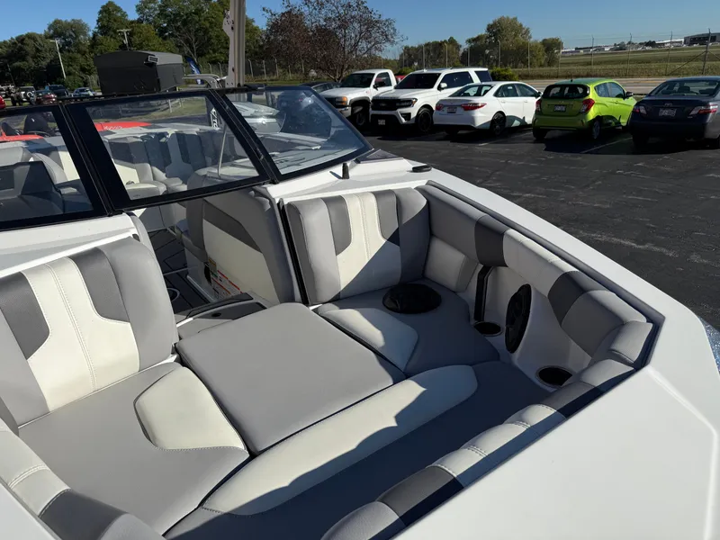 Slide: The Image of Interior of 2022 Malibu Wakesetter 21 LX with gray seating. - 26