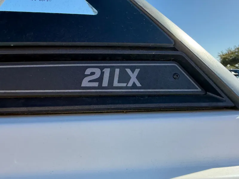 Slide: The Image of Close-up of 2022 Malibu Wakesetter 21 LX logo. - 27