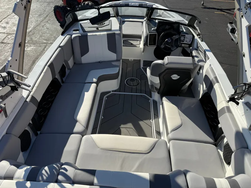 Slide: The Image of Interior of 2022 Malibu Wakesetter 21 LX with gray upholstery. - 5