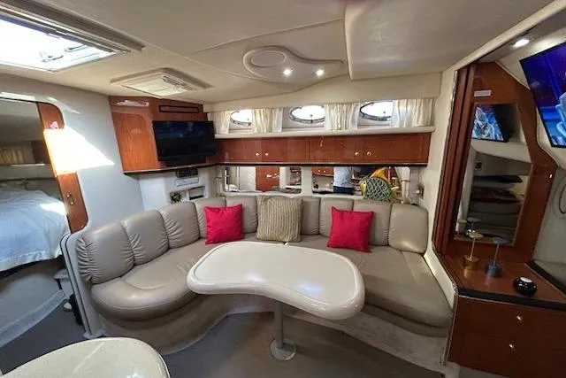 Slide: The Image of Luxurious interior of a 1998 Sea Ray Sundancer 370 yacht with plush seating and modern amenities. - 4
