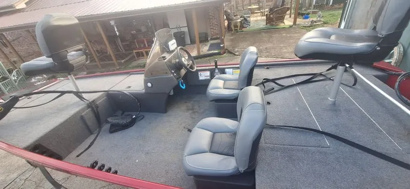 Slide: The Image of Interior view of a 2024 Tracker Bass Tracker Classic XL boat. - 2