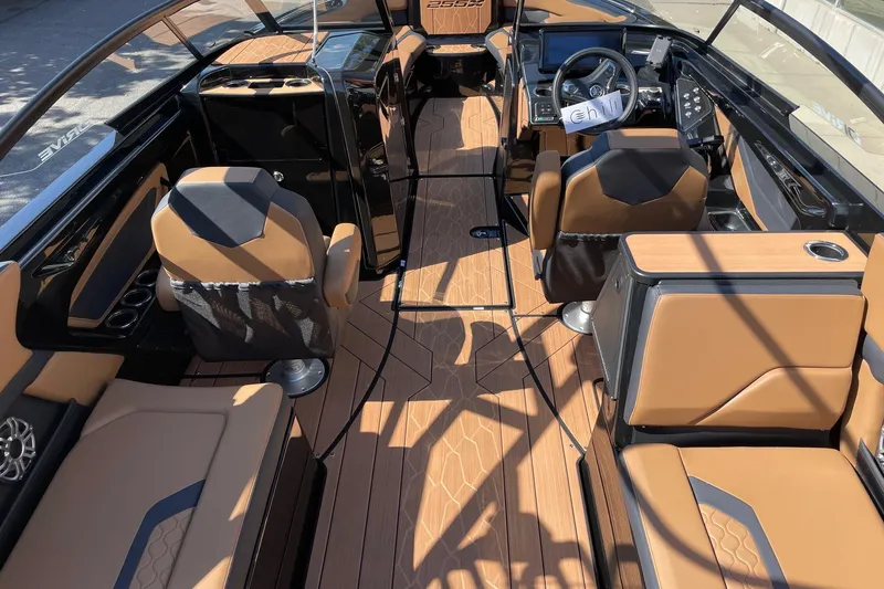 Slide: The Image of 2026 Yamaha Boats 255XD interior with sleek design and luxurious seating. - 5