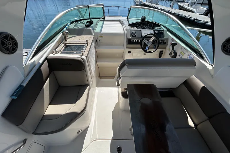 Slide: The Image of 2014 Sea Ray Sundancer 260 boat on trailer, side view, sunny day. - 13
