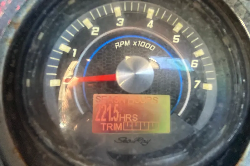 Slide: The Image of 2014 Sea Ray Sundancer 260 boat with seating and table, docked at marina. - 18