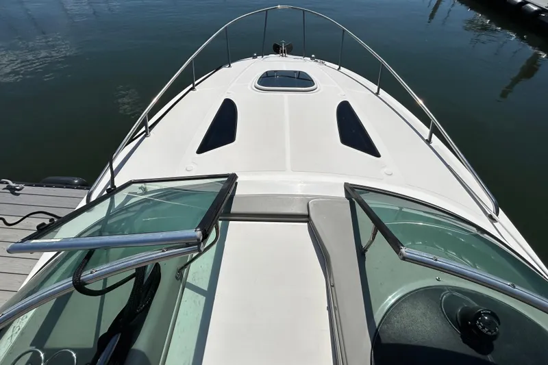 Slide: The Image of 2014 Sea Ray Sundancer 260 boat with "Luz Dolores" name on the stern. - 19