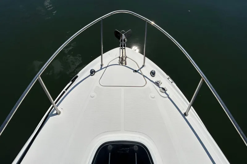 Slide: The Image of Interior view of 2014 Sea Ray Sundancer 260 boat with seating and dashboard. - 22