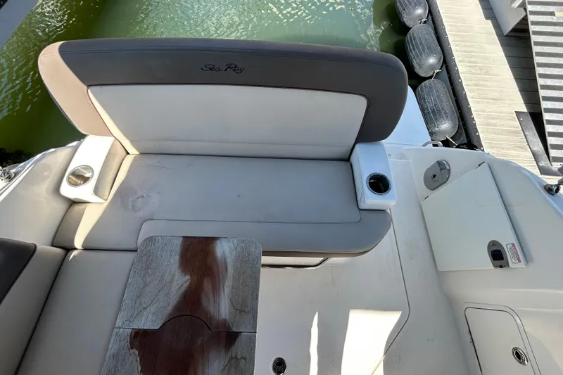 Slide: The Image of Cockpit view of 2014 Sea Ray Sundancer 260 with Garmin navigation system and steering wheel. - 34