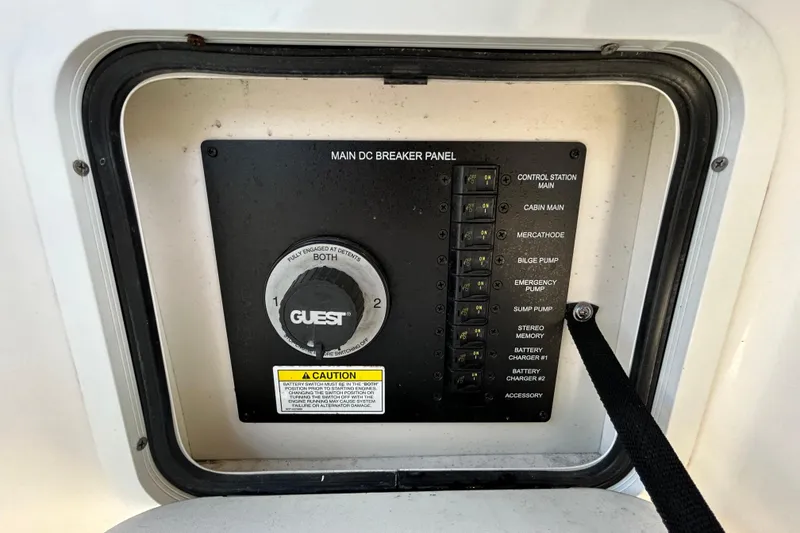 Slide: The Image of Interior of 2014 Sea Ray Sundancer 260 boat featuring a compact kitchenette with sink. - 44