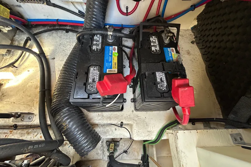 Slide: The Image of Interior of 2014 Sea Ray Sundancer 260 with kitchenette and seating area. - 51