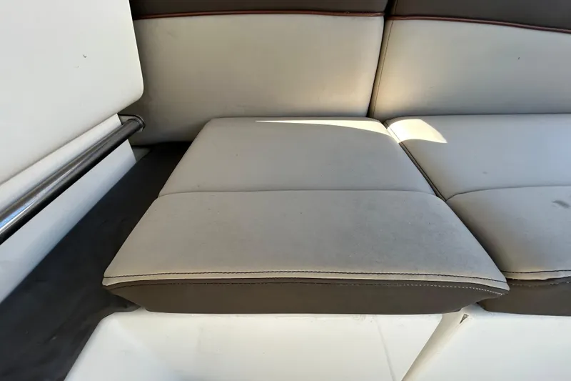 Slide: The Image of Interior cabin of 2014 Sea Ray Sundancer 260 with skylight and seating area. - 57